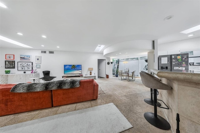 3200 Morris Ln, Miami, FL 33133 - living room featuring recessed lighting and a skylight