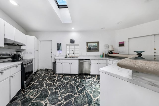 3200 Morris Ln, Miami, FL 33133 - kitchen featuring appliances with stainless steel finishes, under cabinet range hood, recessed lighting, light countertops, and white cabinetry