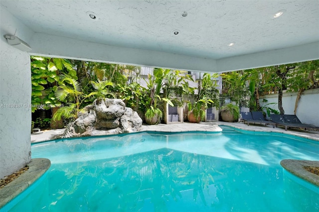 3200 Morris Ln, Miami, FL 33133 - outdoor pool featuring a fenced backyard