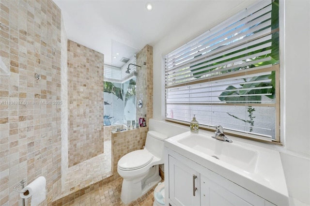 3200 Morris Ln, Miami, FL 33133 - bathroom with a tile shower, vanity, and recessed lighting
