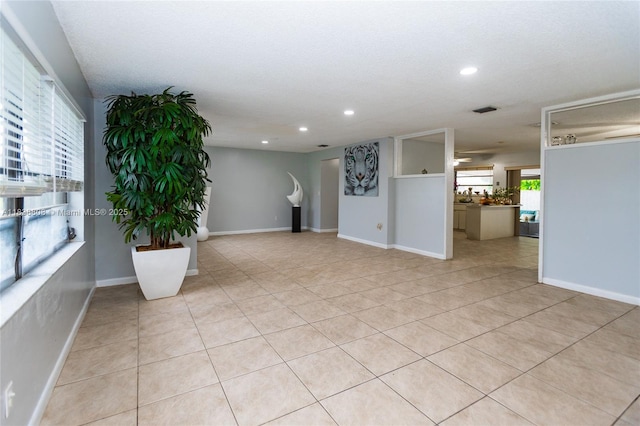 906 Cardinal Pl, Homestead, FL 33035 - unfurnished living room featuring recessed lighting and light tile patterned floors