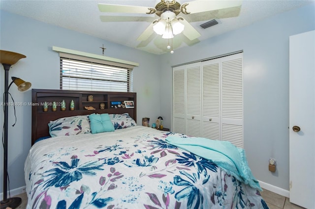 906 Cardinal Pl, Homestead, FL 33035 - tiled bedroom featuring a closet and a ceiling fan