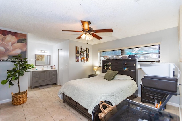 906 Cardinal Pl, Homestead, FL 33035 - bedroom featuring light tile patterned flooring, ensuite bath, and a ceiling fan