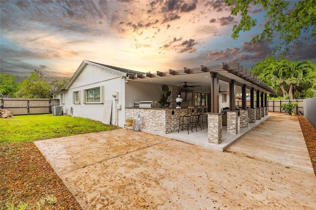 906 Cardinal Pl, Homestead, FL 33035 - back of property featuring a fenced backyard, stucco siding, ceiling fan, a patio, and area for grilling