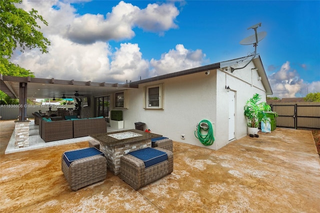 906 Cardinal Pl, Homestead, FL 33035 - back of property featuring an outdoor living space with a fire pit, stucco siding, a patio, and ceiling fan