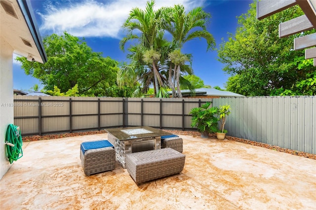 906 Cardinal Pl, Homestead, FL 33035 - fenced backyard featuring a patio area