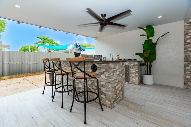 906 Cardinal Pl, Homestead, FL 33035 - wooden terrace featuring a ceiling fan and exterior kitchen