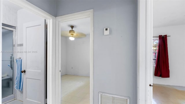 521 SE 5th St, Hialeah, FL 33010 - corridor featuring light tile patterned floors