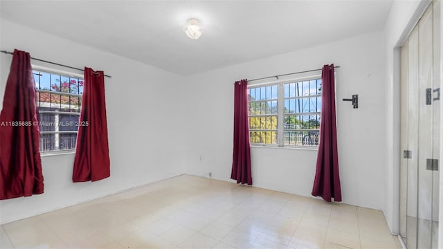 521 SE 5th St, Hialeah, FL 33010 - spare room with plenty of natural light
