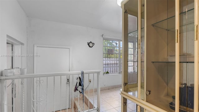 521 SE 5th St, Hialeah, FL 33010 - corridor featuring tile patterned flooring