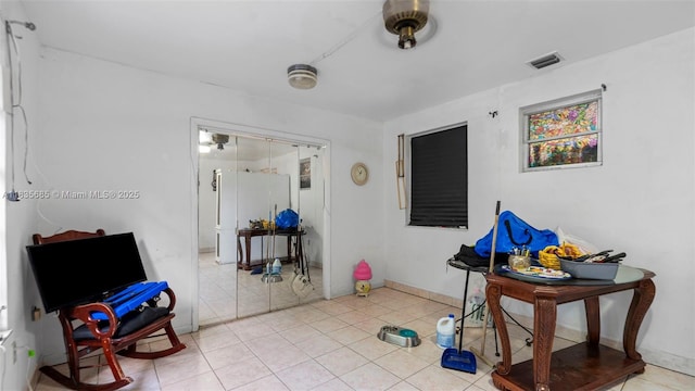 521 SE 5th St, Hialeah, FL 33010 - sitting room featuring tile patterned floors