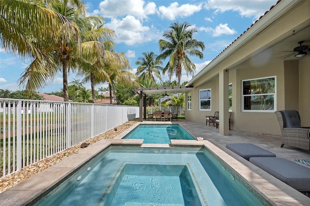 19252 N Hibiscus St, Weston, FL 33332 - view of pool with ceiling fan, a fenced backyard, a pool with connected hot tub, and a patio