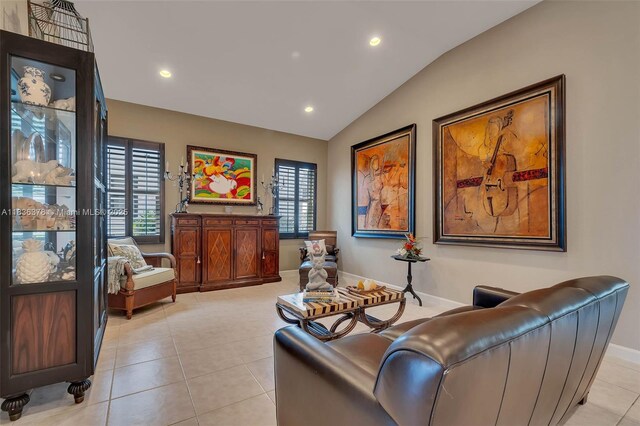 19252 N Hibiscus St, Weston, FL 33332 - living room featuring vaulted ceiling, light tile patterned floors, and recessed lighting