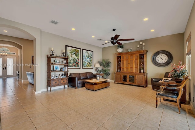 19252 N Hibiscus St, Weston, FL 33332 - living area featuring light tile patterned floors, arched walkways, a ceiling fan, and recessed lighting