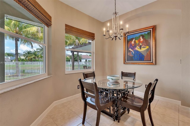 19252 N Hibiscus St, Weston, FL 33332 - dining room with a chandelier and light tile patterned floors