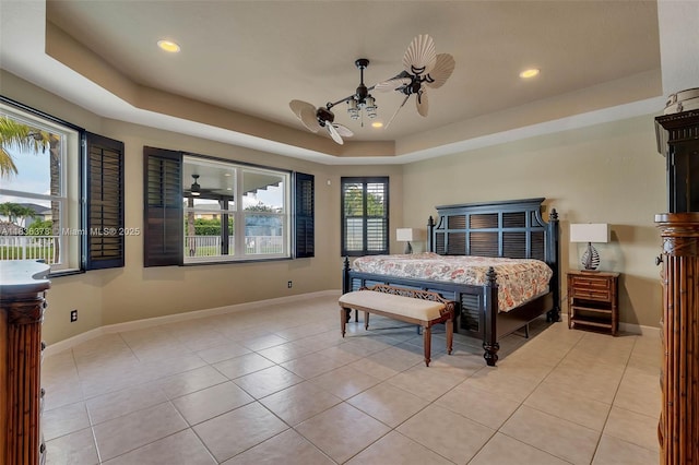 19252 N Hibiscus St, Weston, FL 33332 - bedroom with light tile patterned flooring, a tray ceiling, and recessed lighting