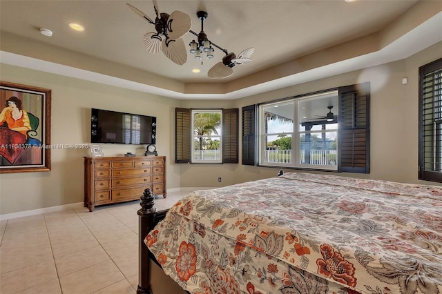 19252 N Hibiscus St, Weston, FL 33332 - bedroom featuring light tile patterned floors, recessed lighting, ceiling fan, and a raised ceiling