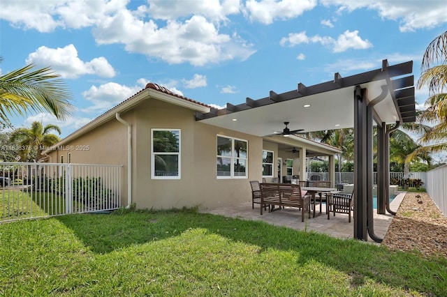 19252 N Hibiscus St, Weston, FL 33332 - rear view of property featuring ceiling fan, a fenced backyard, stucco siding, and a patio