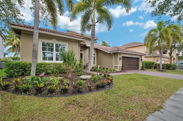 19252 N Hibiscus St, Weston, FL 33332 - mediterranean / spanish-style home with stucco siding, an attached garage, concrete driveway, and a tiled roof