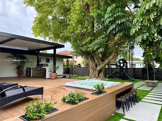 641 Nightingale Ave, Miami Springs, FL 33166 - deck featuring a playground and a grill