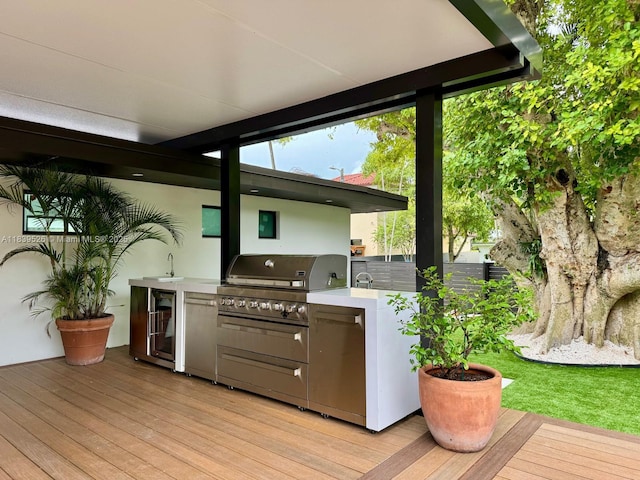 641 Nightingale Ave, Miami Springs, FL 33166 - wooden terrace with area for grilling and beverage cooler