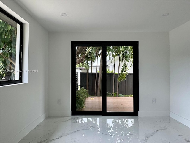 641 Nightingale Ave, Miami Springs, FL 33166 - empty room featuring marble tiled floors and recessed lighting