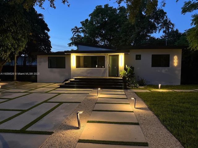 641 Nightingale Ave, Miami Springs, FL 33166 - view of front facade with stucco siding