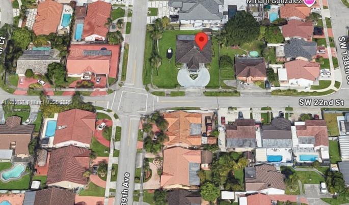 13895 SW 22nd St, Miami, FL 33175 - aerial view of property's location with nearby suburban area