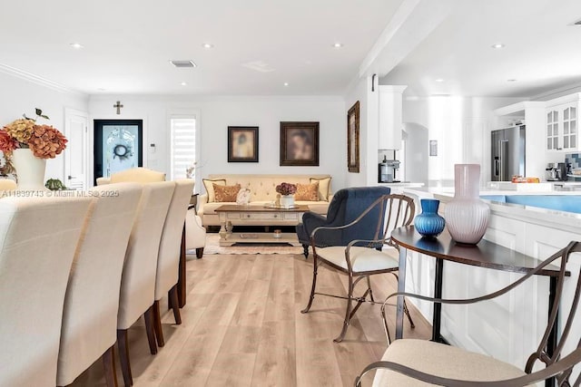 9031 SW 66th Ter, Miami, FL 33173 - living room with light wood-style floors, crown molding, and recessed lighting