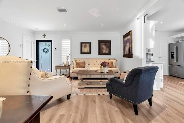 9031 SW 66th Ter, Miami, FL 33173 - living room featuring light wood finished floors, crown molding, and recessed lighting