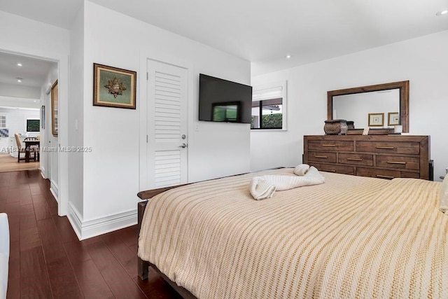 9031 SW 66th Ter, Miami, FL 33173 - bedroom with dark wood finished floors, a closet, and recessed lighting