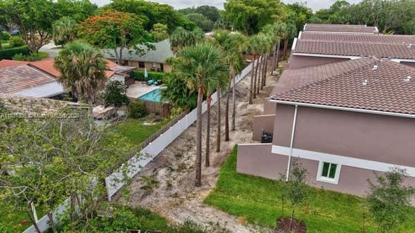 1563 NW 94th Way Unit 09, Coral Springs, FL 33071 - view from above of property with a pool