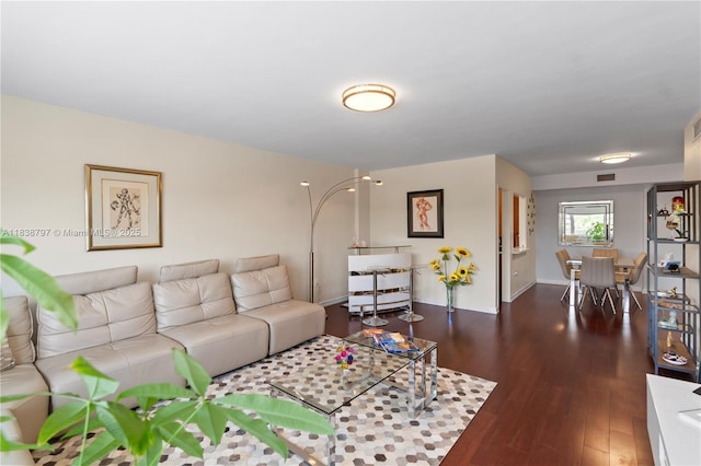 1700 NE 105th St Unit 312, Miami Shores, FL 33138 - living room with dark wood finished floors
