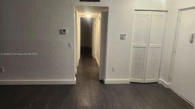 2501 NW 41st Ave Unit 201, Lauderhill, FL 33313 - hall featuring a textured wall and dark wood-style flooring