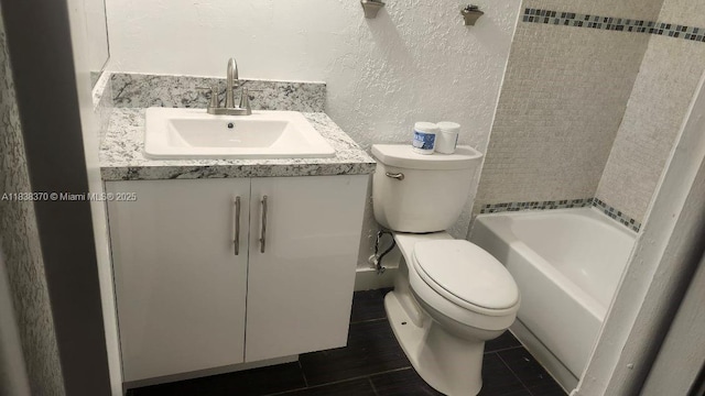 2501 NW 41st Ave Unit 201, Lauderhill, FL 33313 - bathroom featuring a textured wall, vanity, shower / bathtub combination, and tile patterned flooring