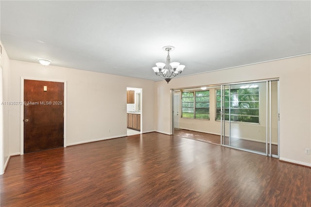 16805 SW 113th Ave Unit V41443, Miami, FL 33157 - spare room featuring a chandelier and wood finished floors