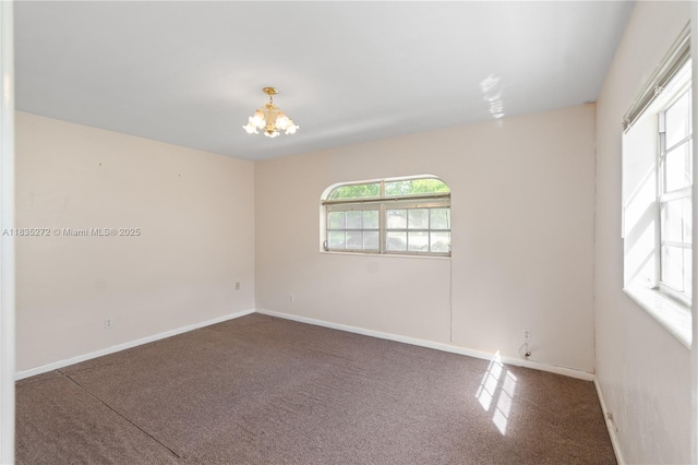 16805 SW 113th Ave Unit V41443, Miami, FL 33157 - carpeted spare room featuring a chandelier and baseboards