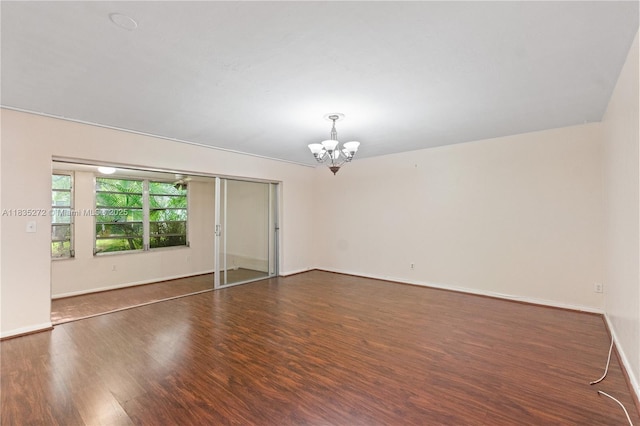 16805 SW 113th Ave Unit V41443, Miami, FL 33157 - empty room with a chandelier and wood finished floors