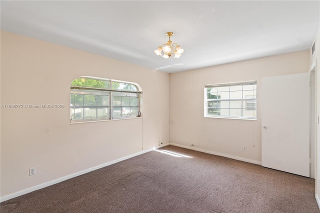 16805 SW 113th Ave Unit V41443, Miami, FL 33157 - spare room featuring plenty of natural light, a chandelier, and carpet floors