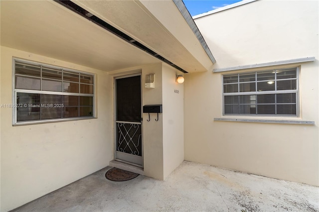 16805 SW 113th Ave Unit V41443, Miami, FL 33157 - doorway to property featuring stucco siding