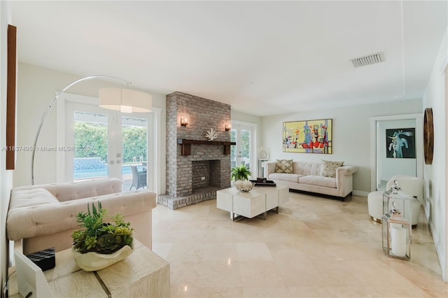 8501 SW 72nd Ter, Miami, FL 33143 - living area featuring french doors and a fireplace
