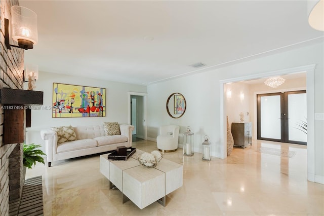8501 SW 72nd Ter, Miami, FL 33143 - living room with a chandelier and french doors