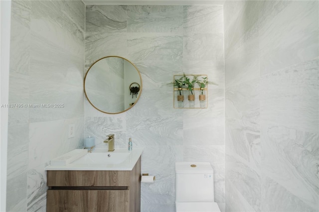 8501 SW 72nd Ter, Miami, FL 33143 - bathroom featuring tile walls and vanity