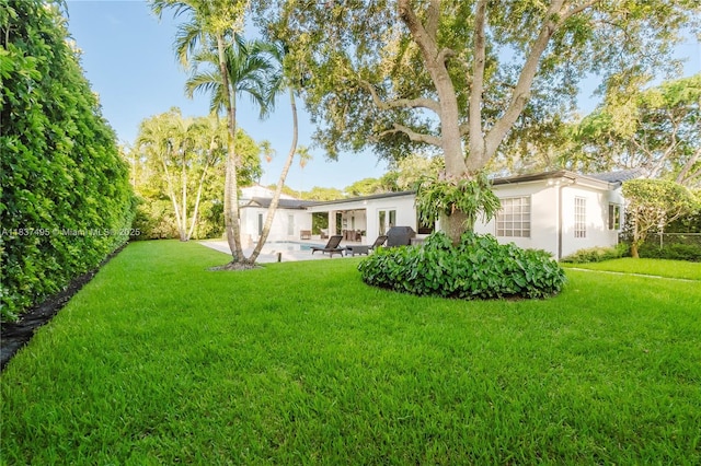 8501 SW 72nd Ter, Miami, FL 33143 - view of grassy yard featuring a patio