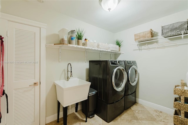 8501 SW 72nd Ter, Miami, FL 33143 - washroom with washing machine and clothes dryer and baseboards