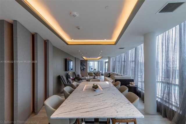 4010 S Ocean Dr Unit R509, Hollywood, FL 33019 - dining area featuring a tray ceiling
