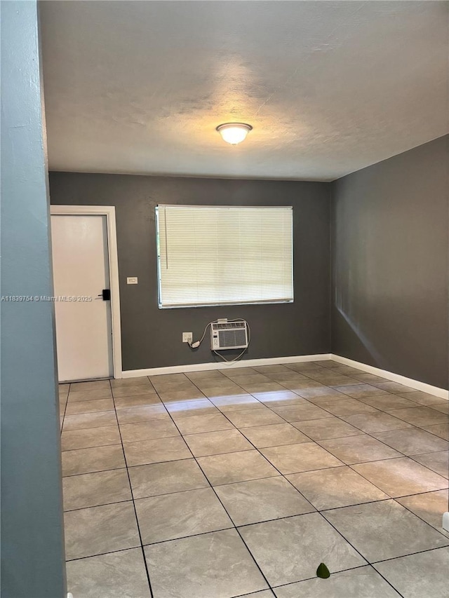 5010 NW 2nd Ave, Miami, FL 33127 - unfurnished room with a wall mounted AC and light tile patterned floors