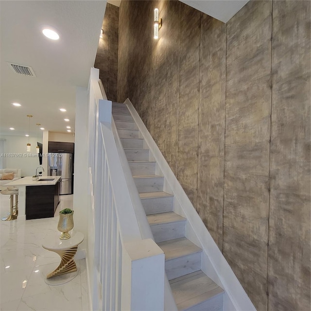 10440 NW 67th St Unit 10440, Doral, FL 33178 - staircase featuring recessed lighting