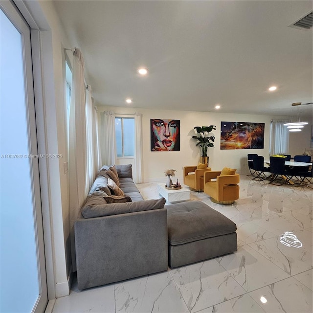 10440 NW 67th St Unit 10440, Doral, FL 33178 - living area with recessed lighting and marble finish flooring