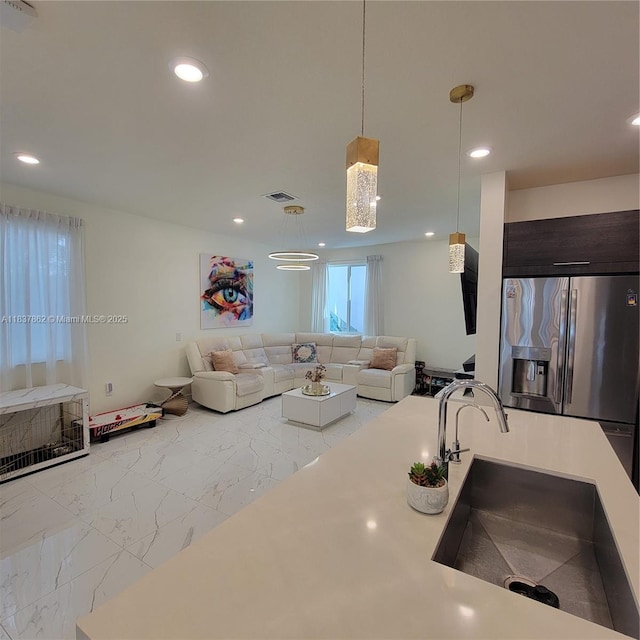 10440 NW 67th St Unit 10440, Doral, FL 33178 - living area with marble finish floors and recessed lighting